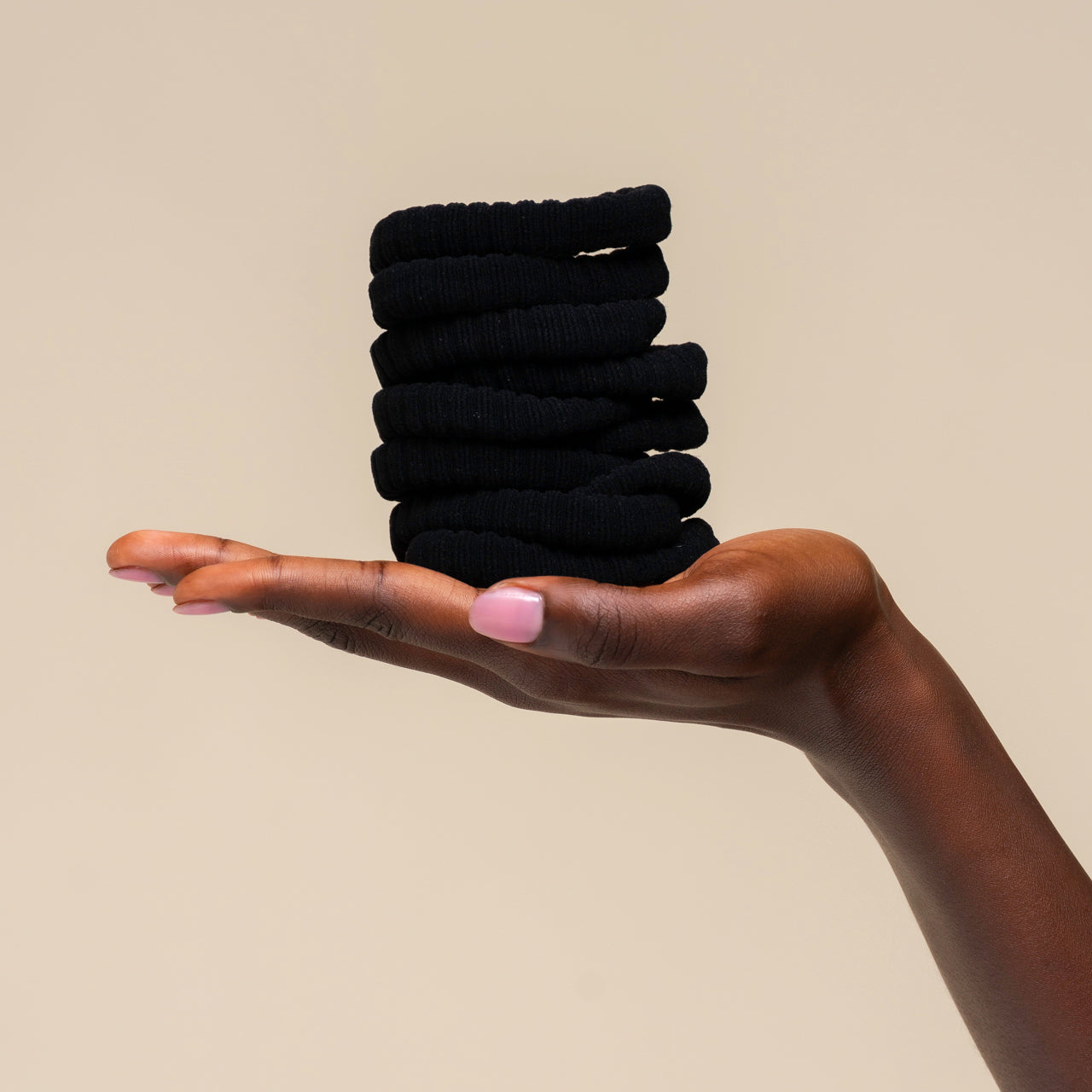 508757-RecycledFabricRibbedHairElastics-10pc-TrendHairAccessories-Black-Model-Hand-1280x1280px.jpg